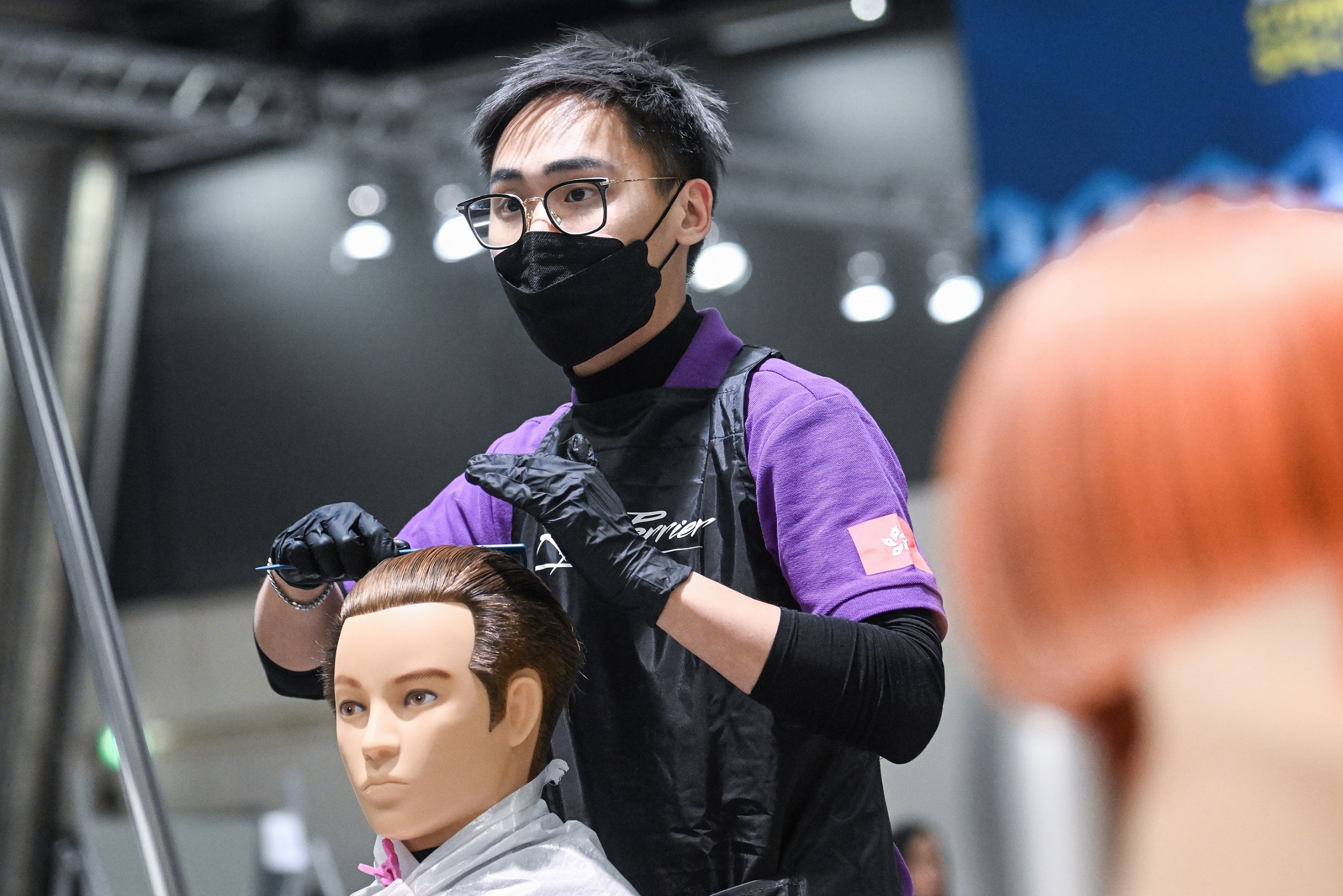 LEE Ka-ho, the Youth College graduate of Diploma of Vocational Education (Hairdressing) won the Medallion for Excellence in the Hairdressing trade. He recalled being thrilled when the result was announced. (Photo credit: WorldSkills International)